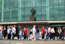 Man-United-fans-queue-outside-old-trafford