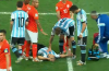 Javier Mascherano collapses after a nasty clash of heads