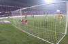 David James gets tanlged in the net after kicking a post in frustration