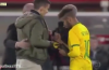 Neymar tries to sign Barcelona fans’ shirt before he’s whisked away by henchman