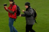 Don’t mind us! Two completely oblivious pitch invaders interrupt Basel vs Real Madrid