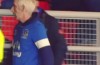 Gross! Everton fan caught wiping his snot on women’s head