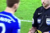 Michael Oliver softens the blow of a yellow card with a hand shake for Ivanovic