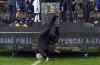 Australian FA Chief Frank Lowy falls off stage during A-League trophy presentation