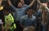 Gerard Pique leads the Barcelona celebrations decked out in denim on a bus